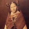 Hopi woman with a pot and traditional clothing