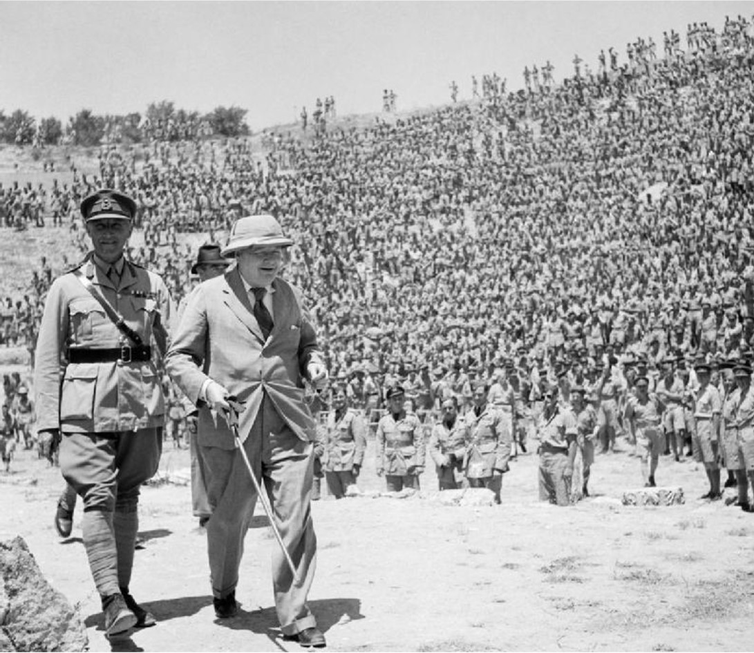 Winston Churchill in the Roman amphitheater of ancient Carthage to address 3,000 British and American troops, June 1943