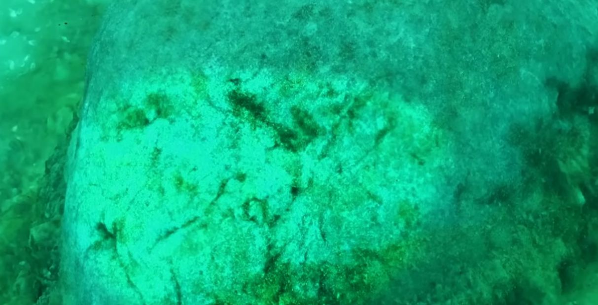 Screenshot of a YouTube video by @DiscoveryUK of the underwater rock formation in Lake Michigan