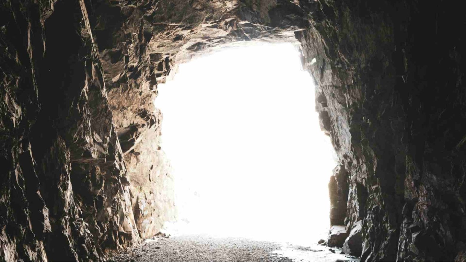 The opening of a tunnel underground.