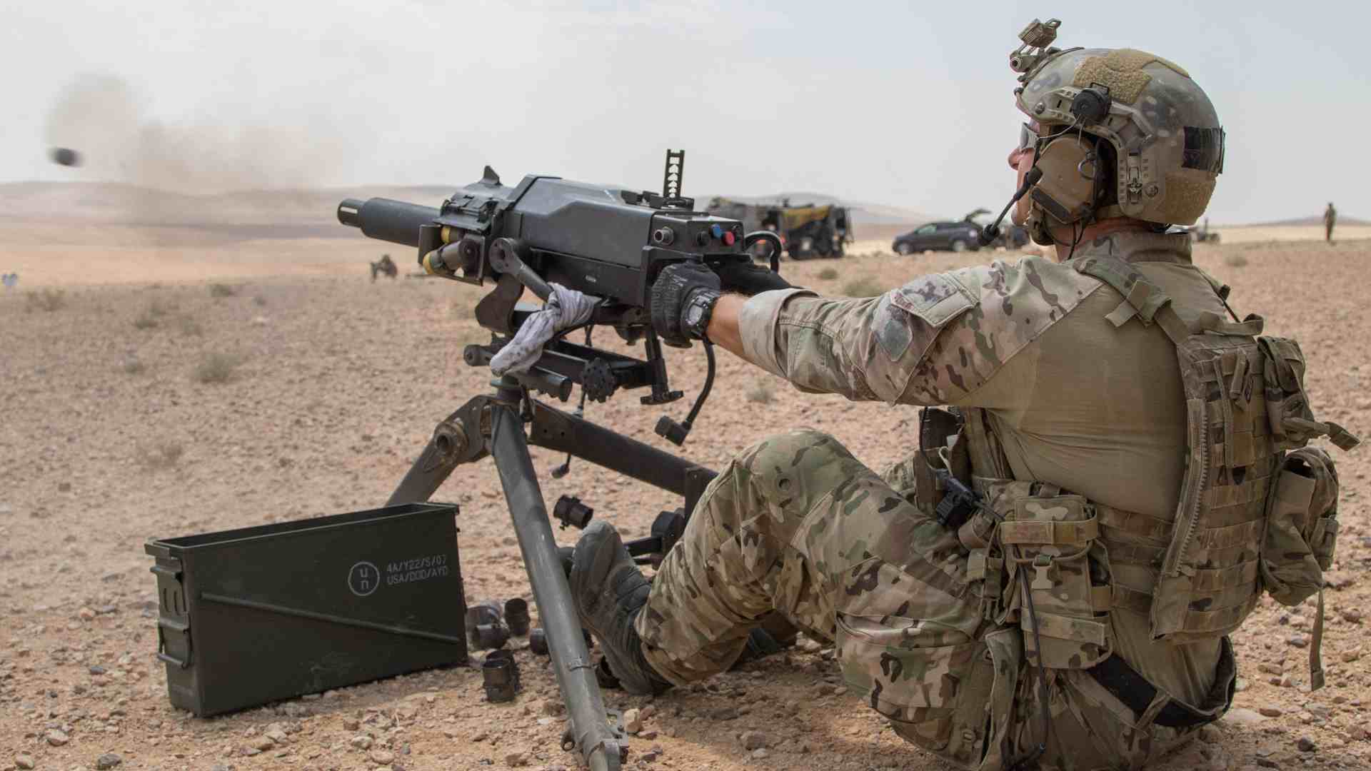 A solider from the US Army Special Operations Command firing a grenade launcher.