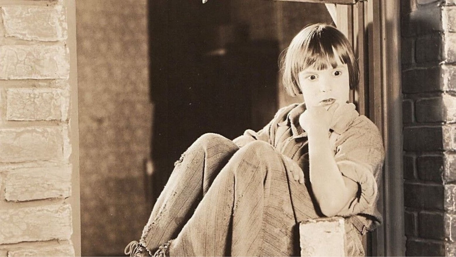 A still featuring Jackie Coogan in the 1925 film “Old Clothes.”