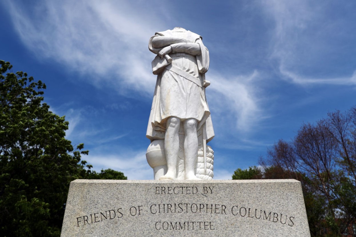 A statue depicting Christopher Columbus is seen with its head removed at Christopher Columbus Waterfront Park on June 10, 2020, in Boston, Massachusetts