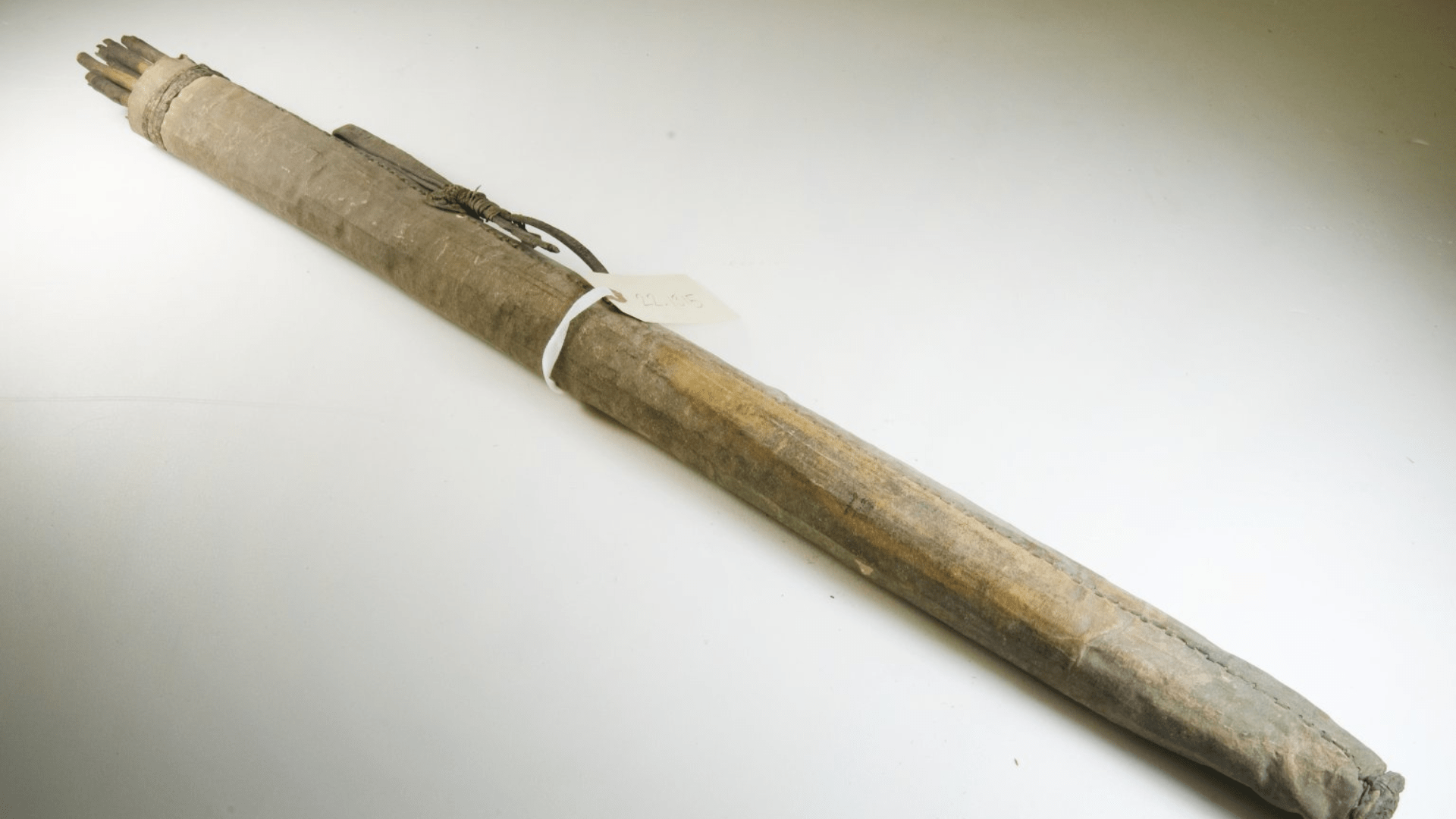 A quiver of wooden arrows.