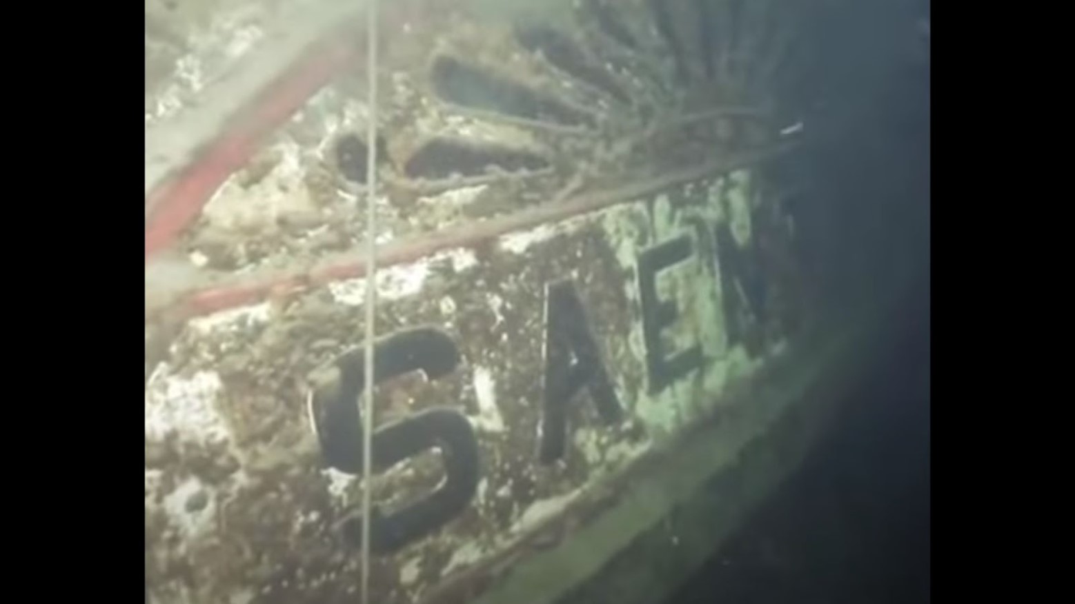 Photograph taken underwater of the Saentis steamship at the bottom of Lake Constance