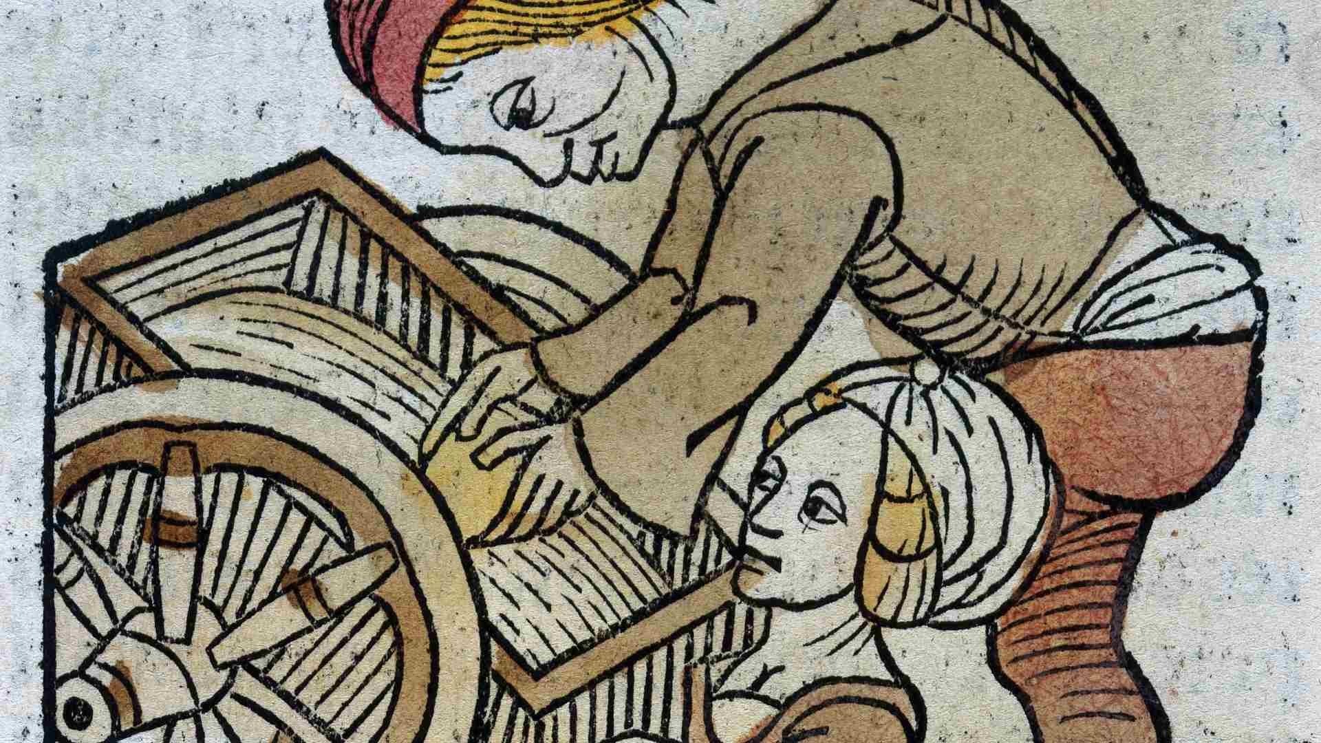 A medieval cart being loaded.