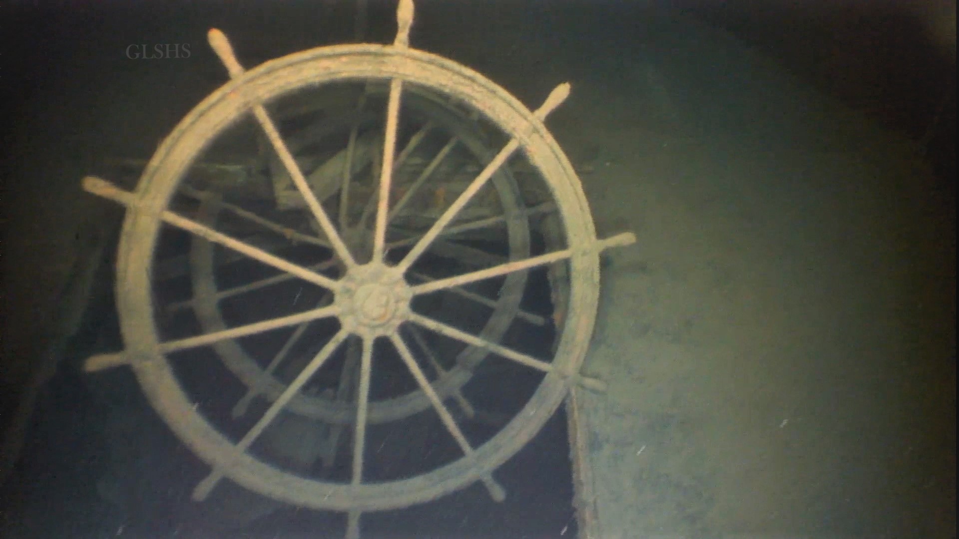 An underwater image of the Arlingotn's steering wheel