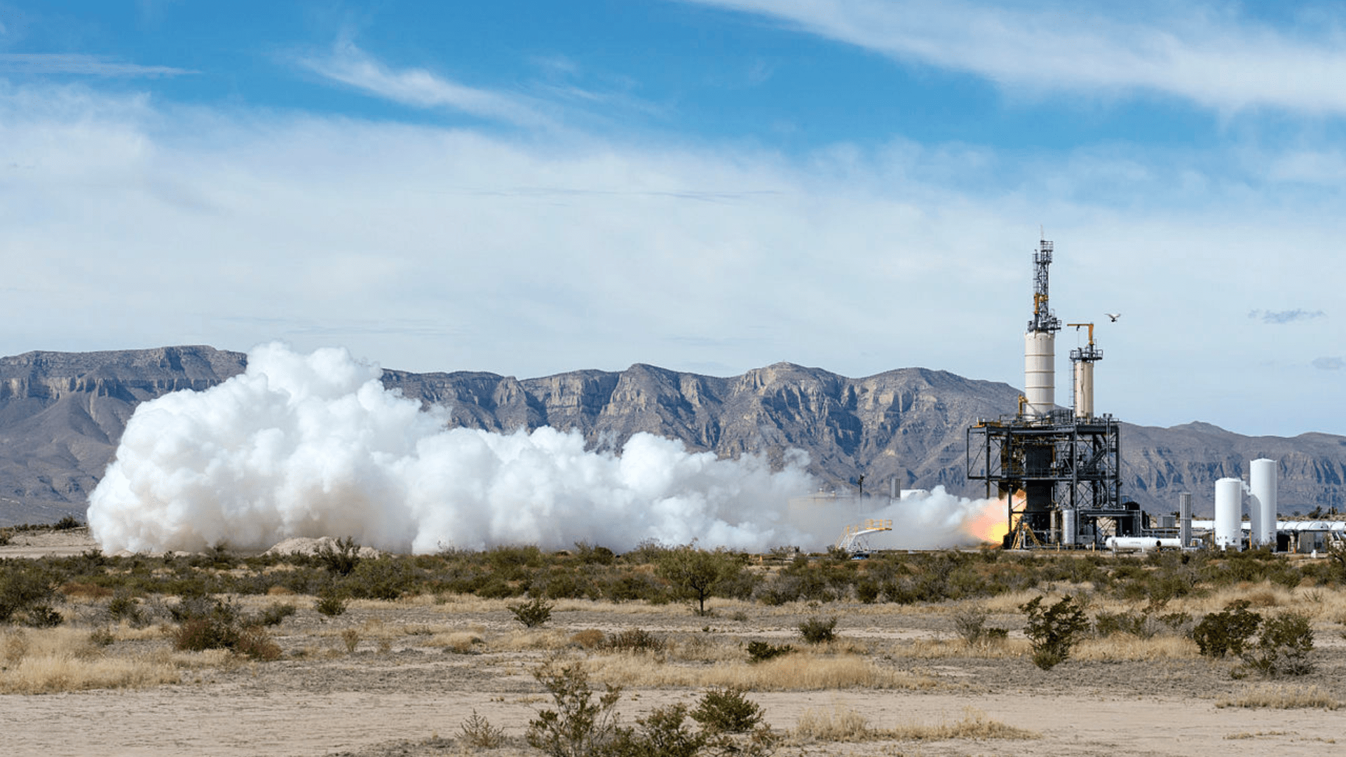 Blue Origin test launching a new rocket in the desert at a West Texas facility.