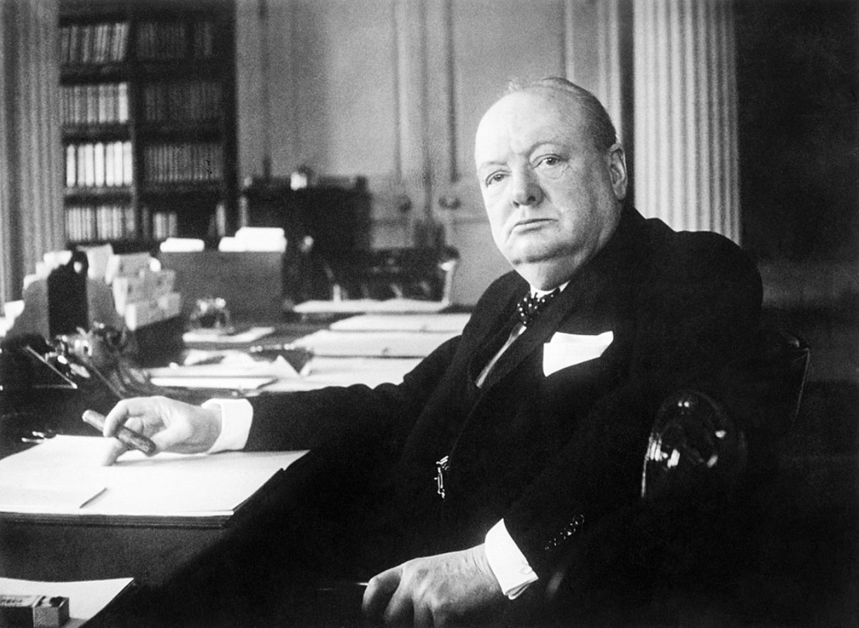 Prime Minister Winston Churchill at his writing desk in 1940