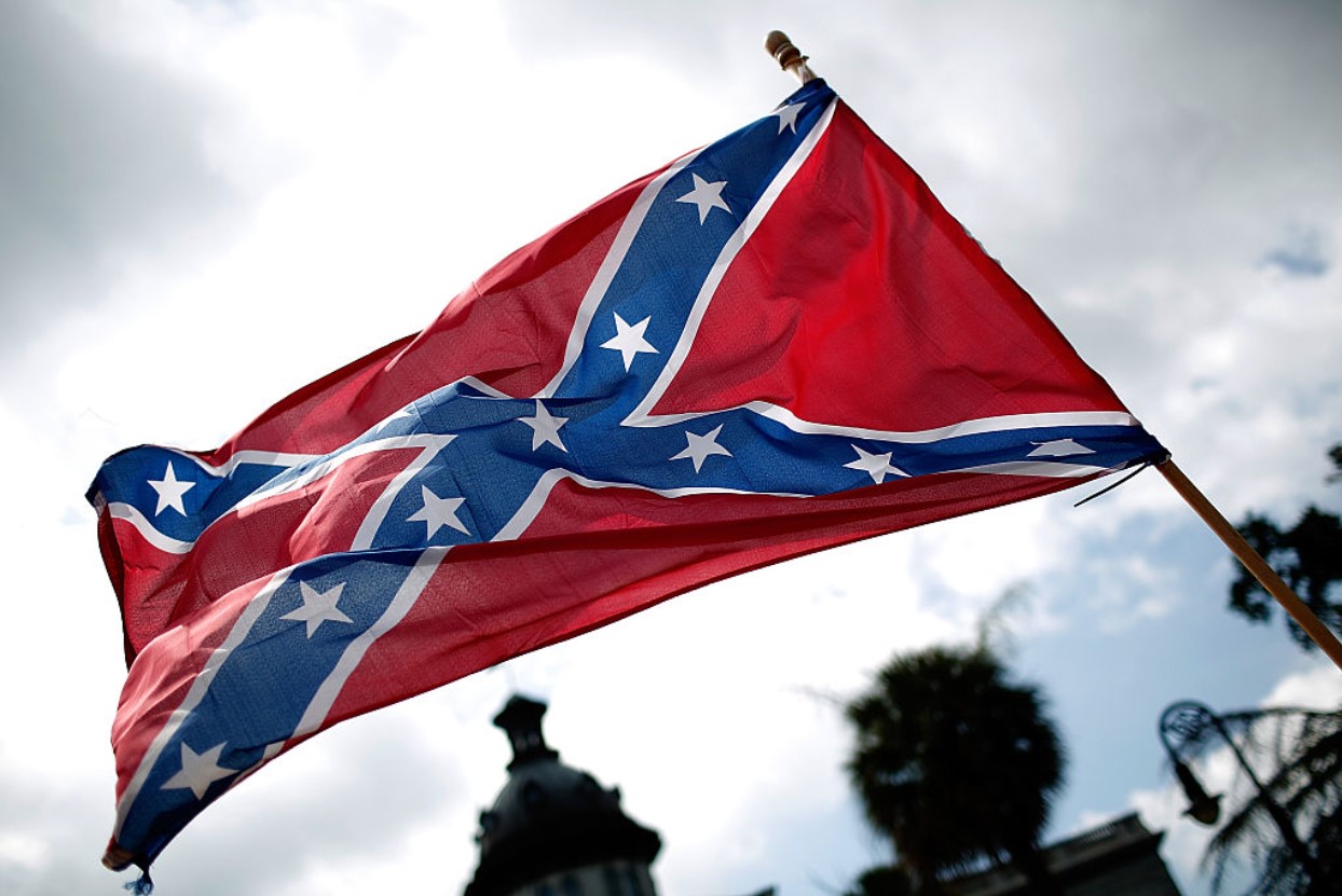 Demonstrators protest at the South Carolina State House calling for the Confederate flag to remain on the State House grounds June 27, 2015, in Columbia, South Carolina