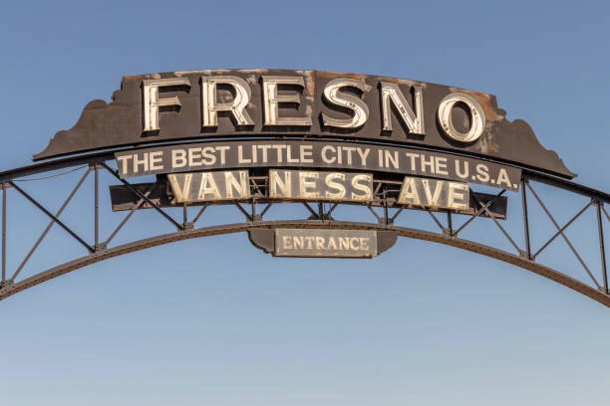 Sign that reads “Fresno, The Best Little City in the U.S.A. Van Ness Ave, Entrance”