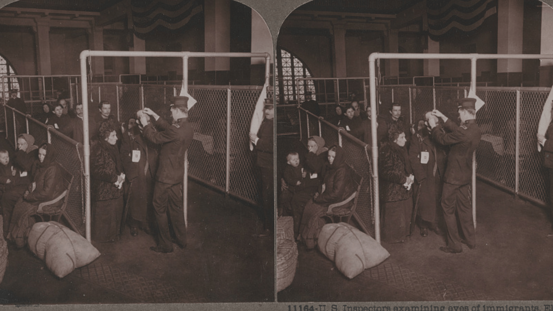 Black-and-white photo of U.S. inspectors examining immigrants' eyes at Ellis Island in 1913.