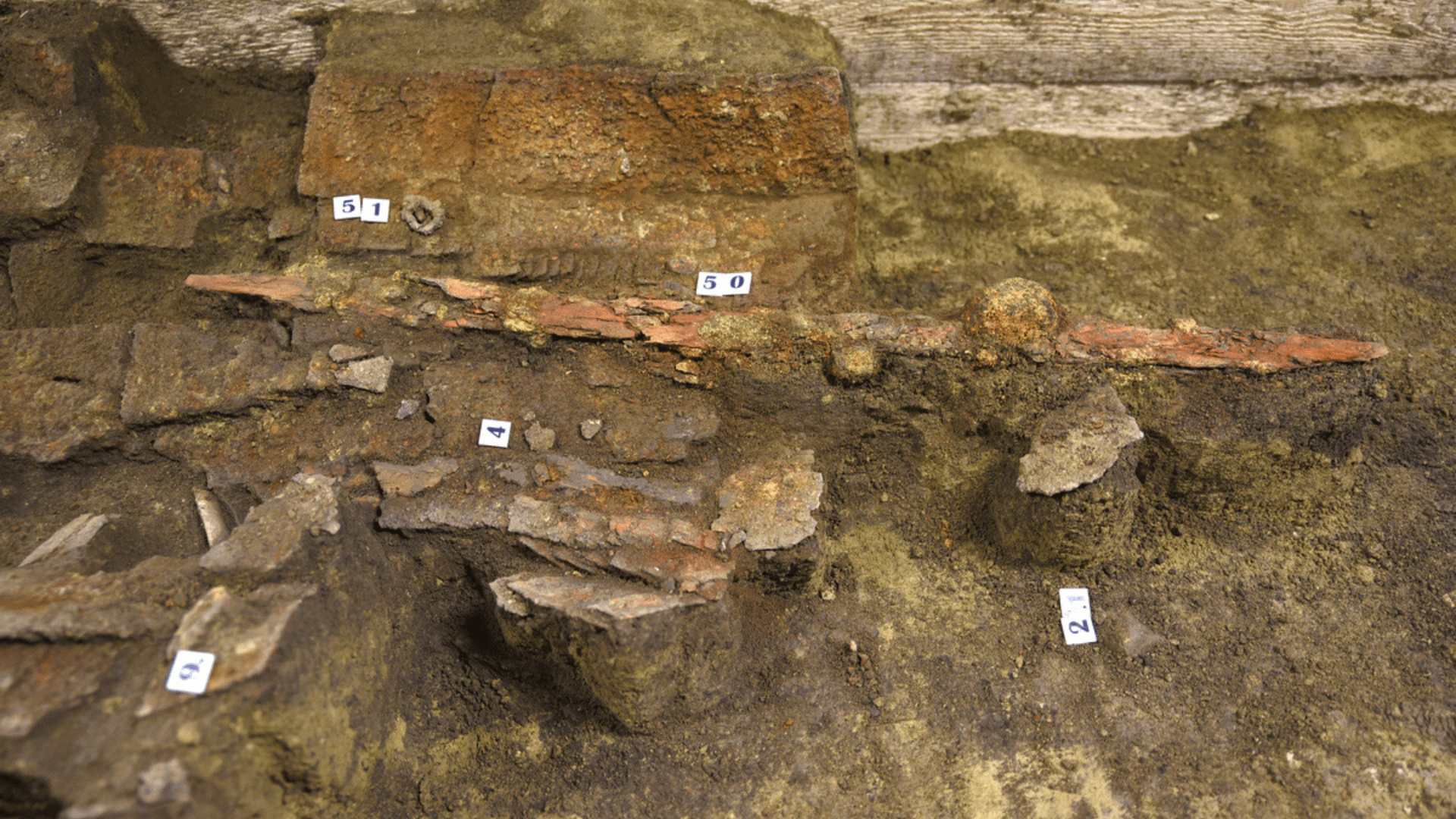 Numbered items from the Avar warrior excavation, including remains of lamellar armor.