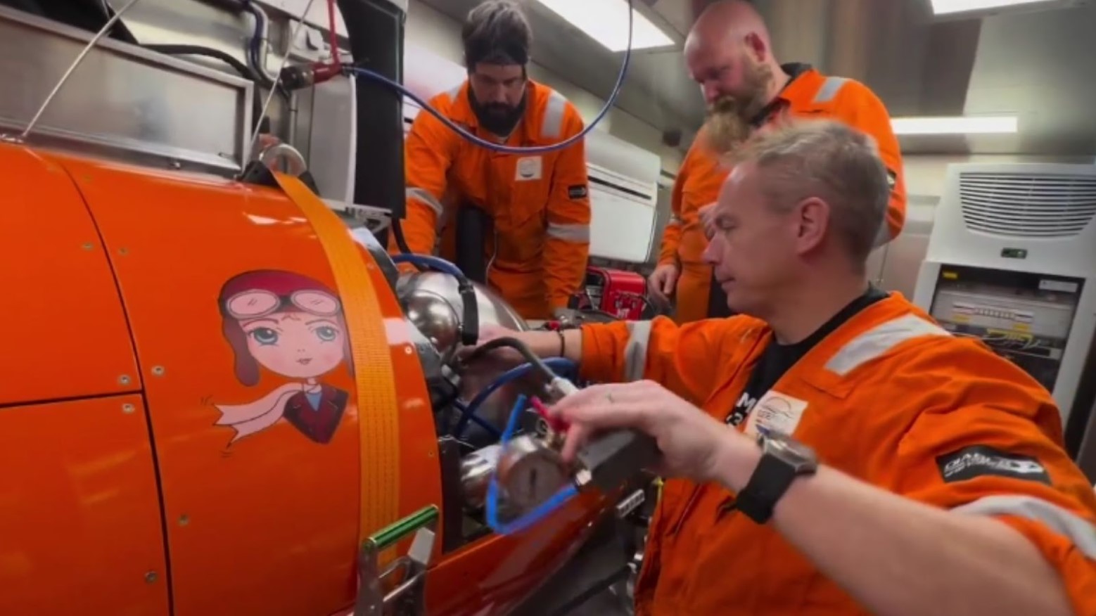 Crew of Deep Sea Visions working on the Kongsberg Discovery HUGIN 6000