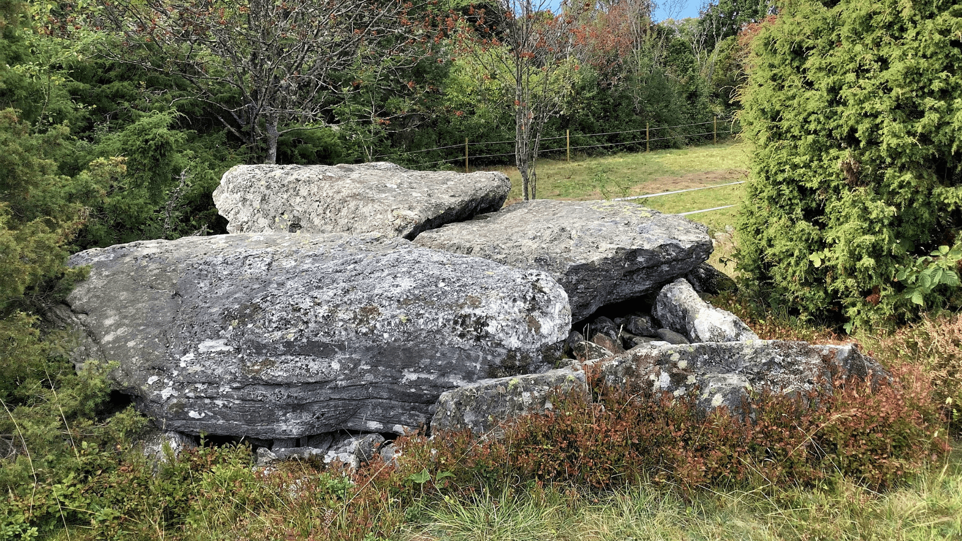 A megalith grave in Sweden composed of large rocks.