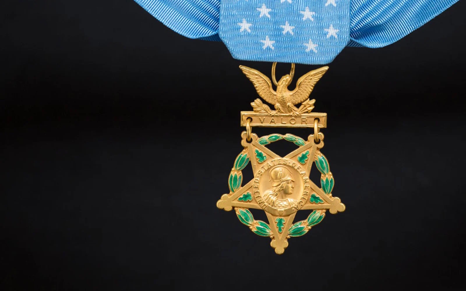 An army Congressional Medal of Honor on a black background