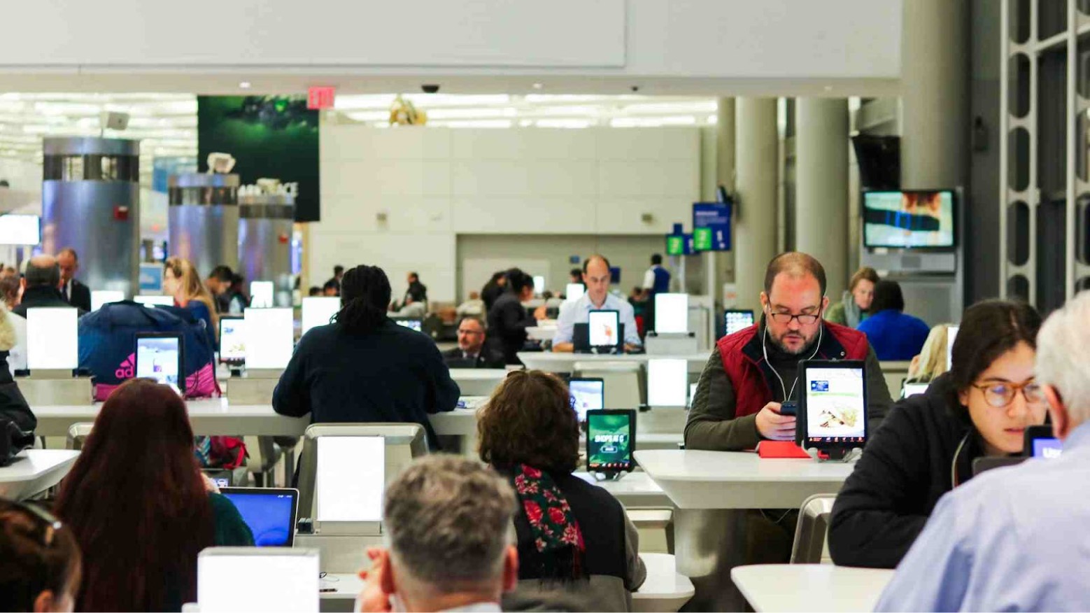 People in a newsroom working around the clock.
