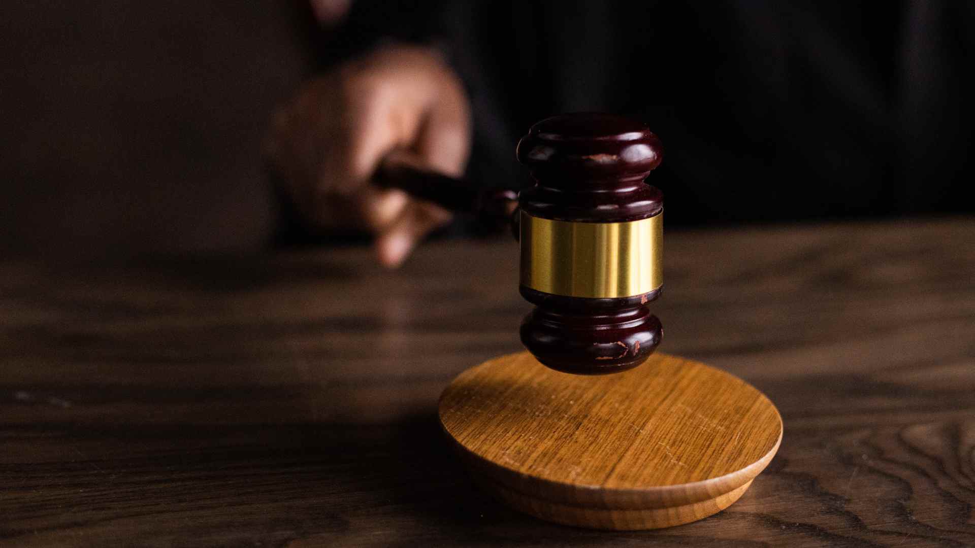 A judge bangs a gavel.