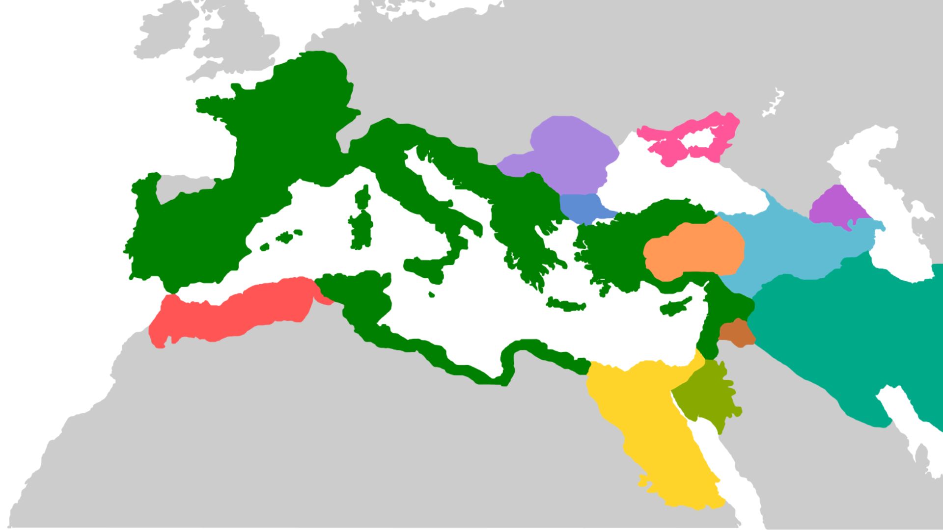 A simplified color-coded map showing the territorial extent of the Roman Empire at its height. The map is centered on the Mediterranean Basin, with various regions shaded in different colors against a gray background representing areas outside the empire's control