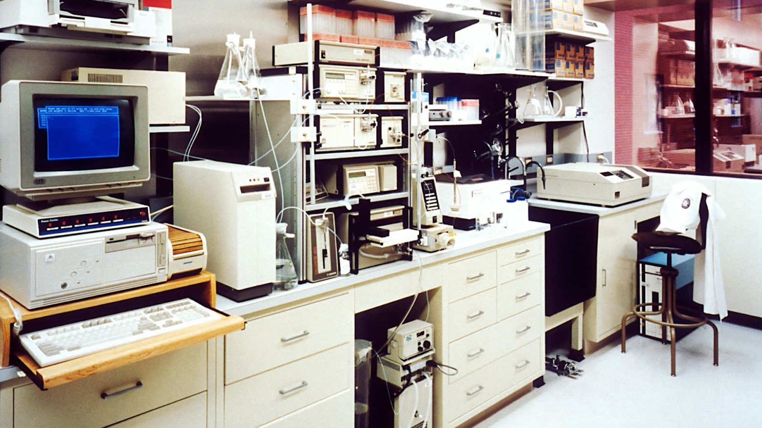 A laboratory in the 90s is shown with outdated equipment