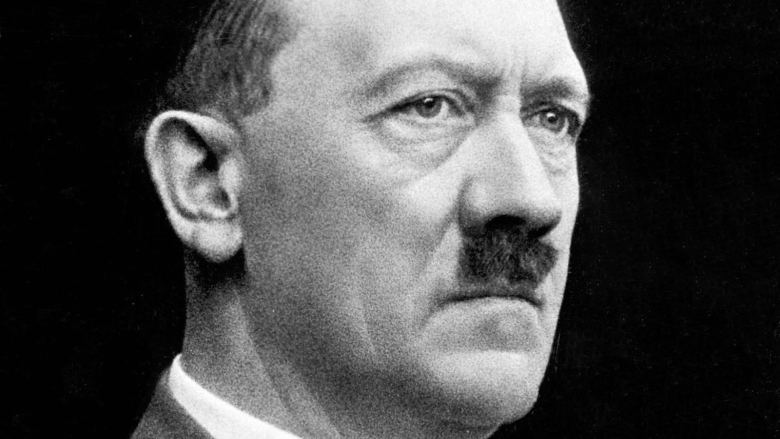 A black and white photo of Adolf Hitler.