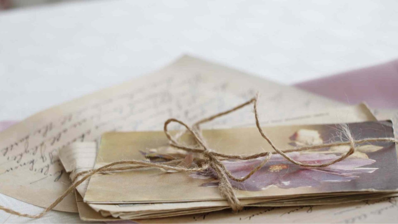 Old documents and paper tied together with string