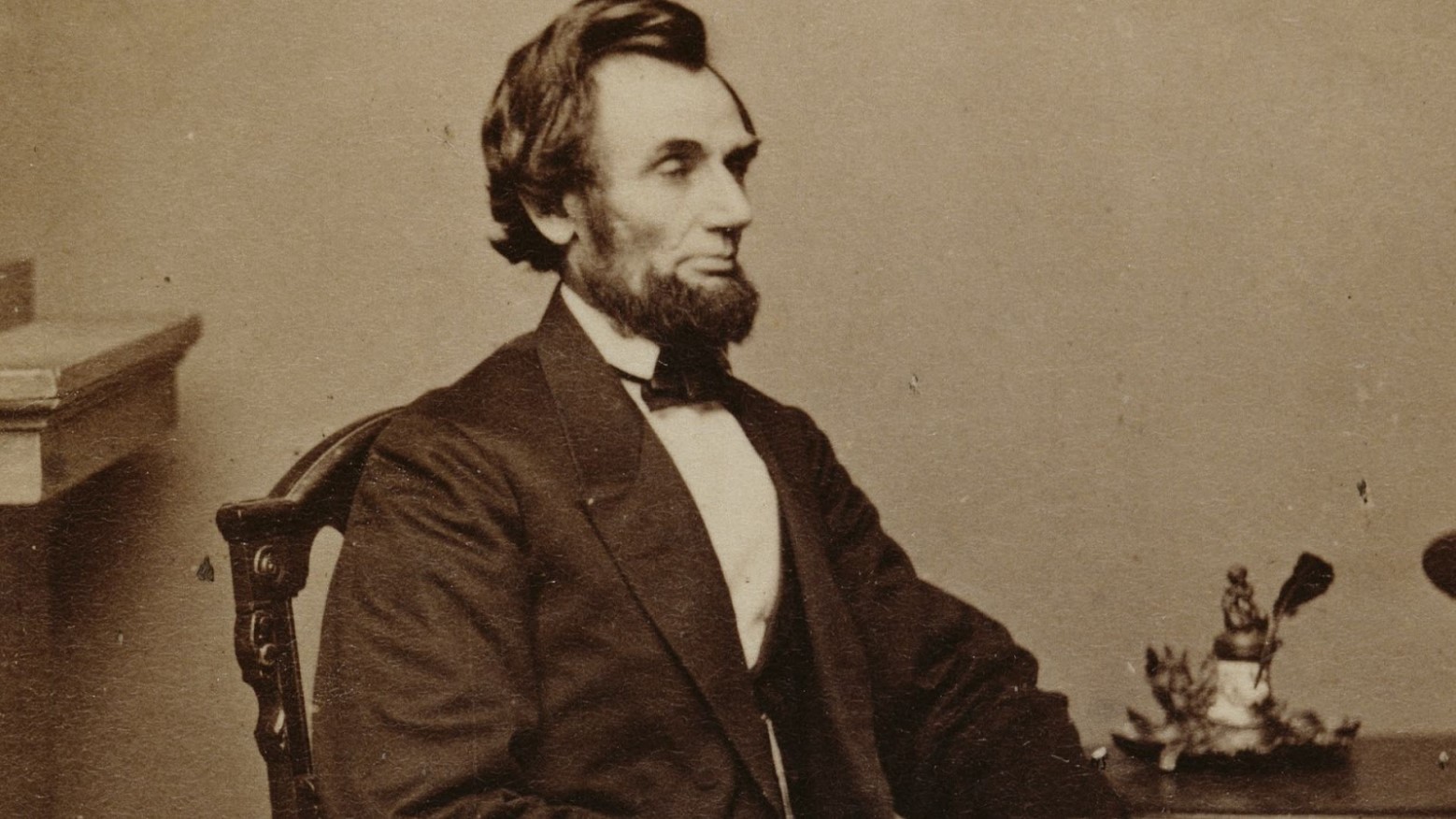 Abraham Lincoln in a sepia photo from 1861.