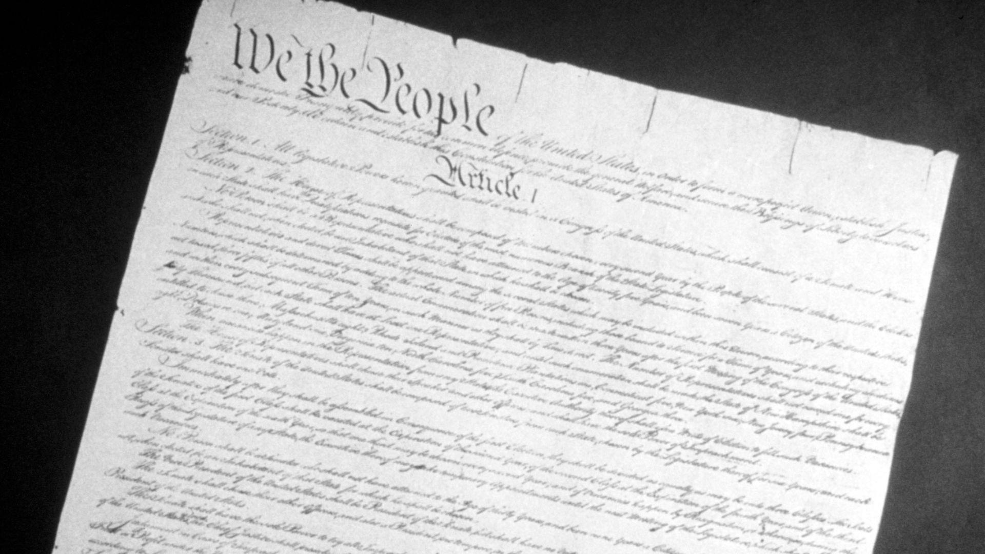 A black and white photo of the real U.S. Constitution.