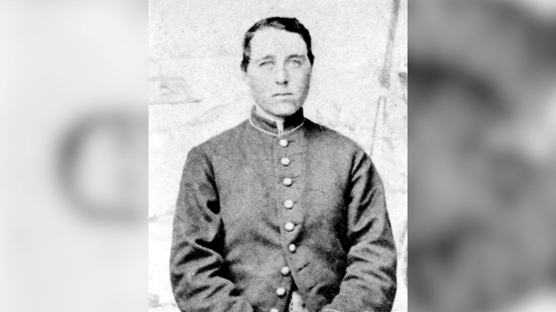 Black-and-white portrait photo of Albert Cashier in military uniform.