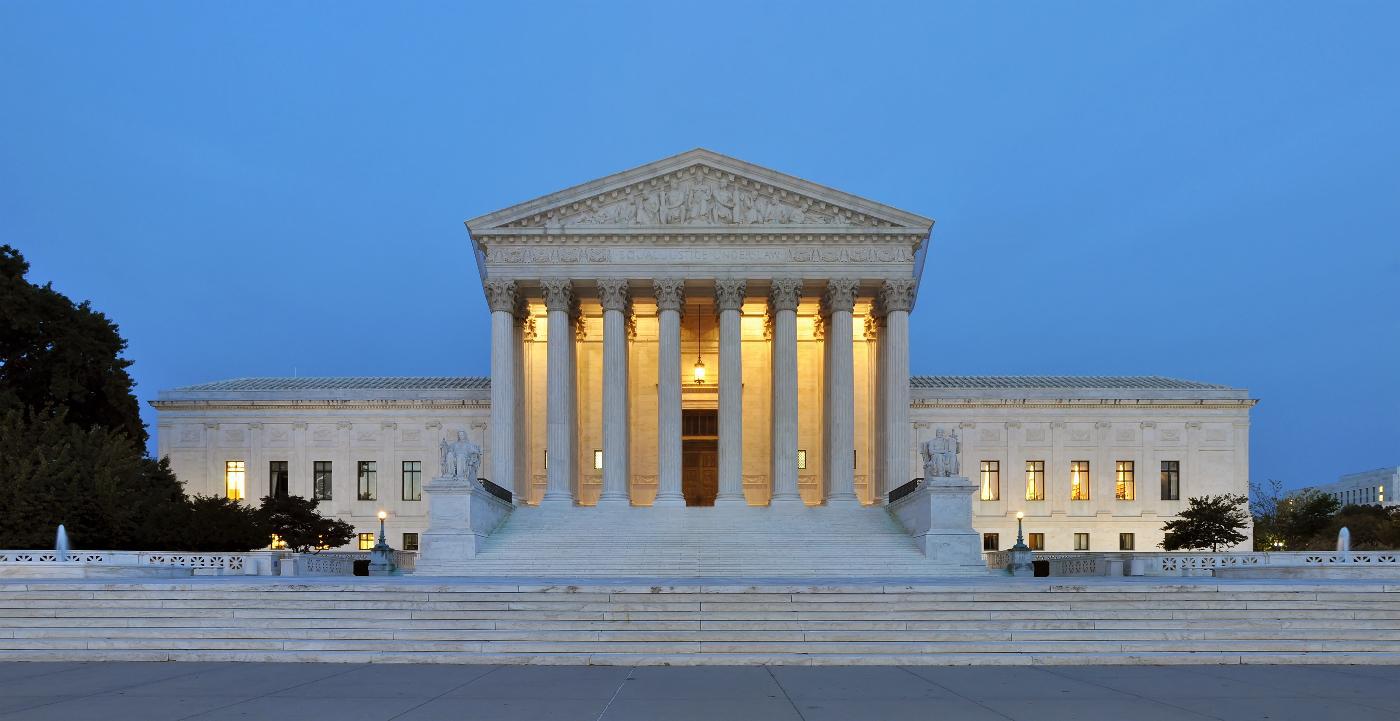 Exterior of the US Supreme Court at dusk