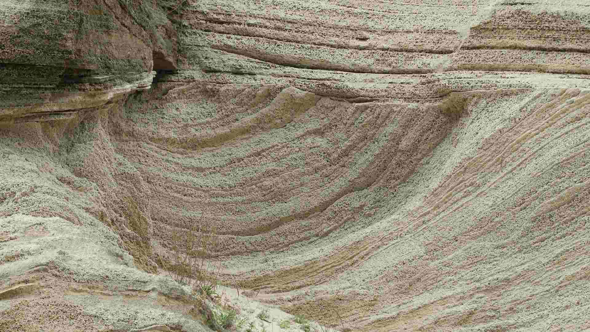 A sand dune petrified in sandstone.