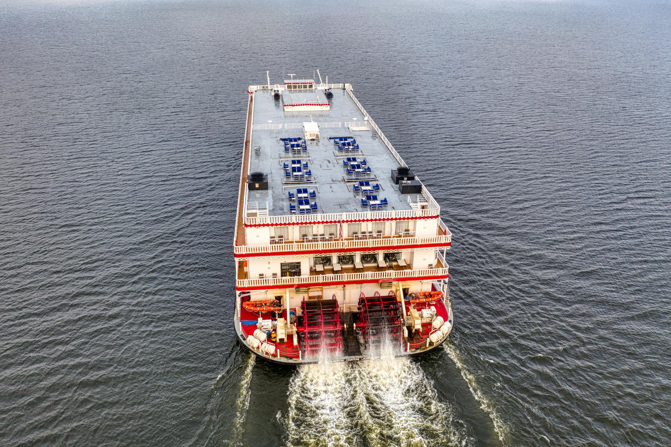 An overhead shot of a cargo shop moving through the ocean