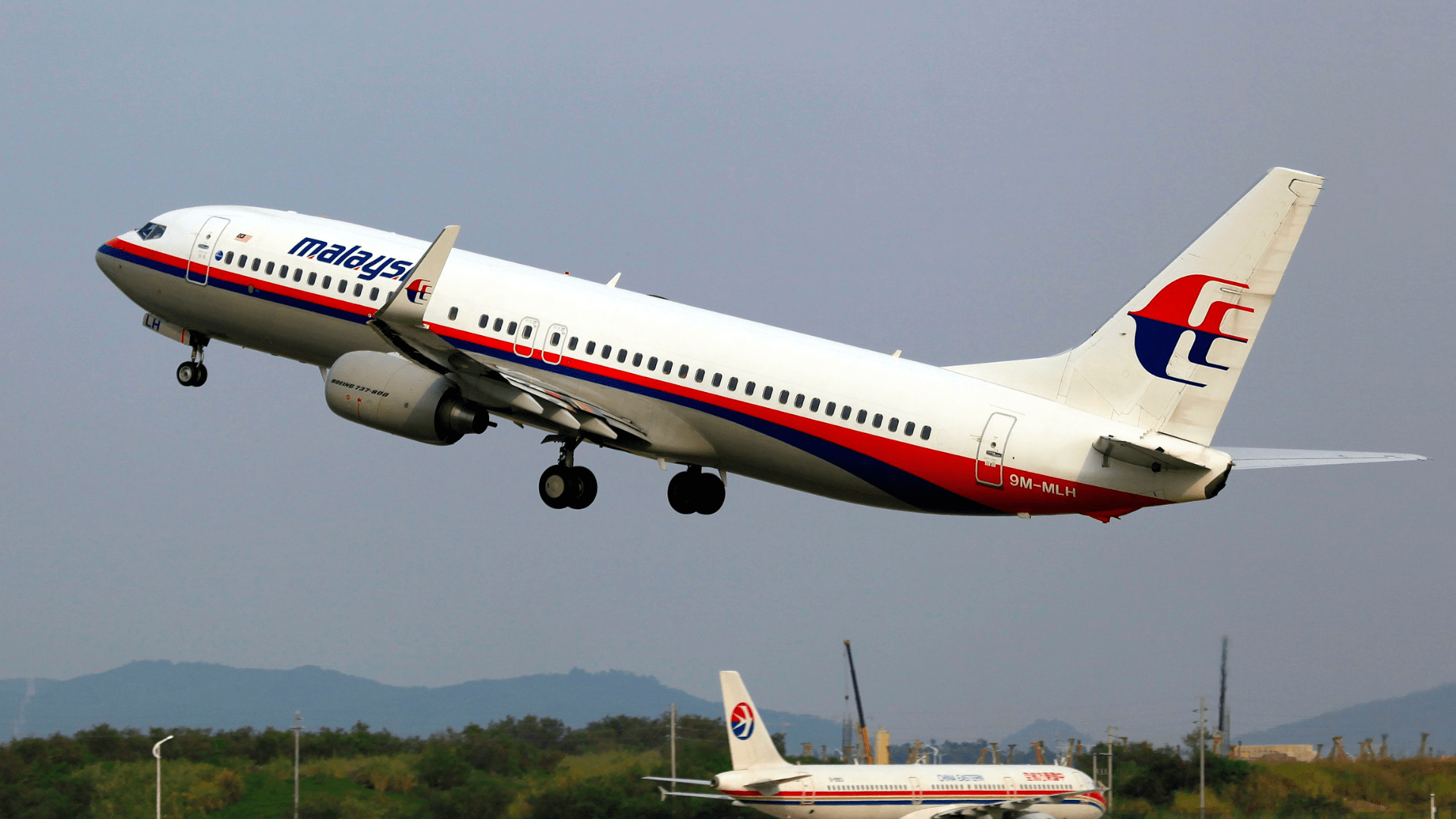 A Malaysian Airlines flight takes off from a Chinese airport.