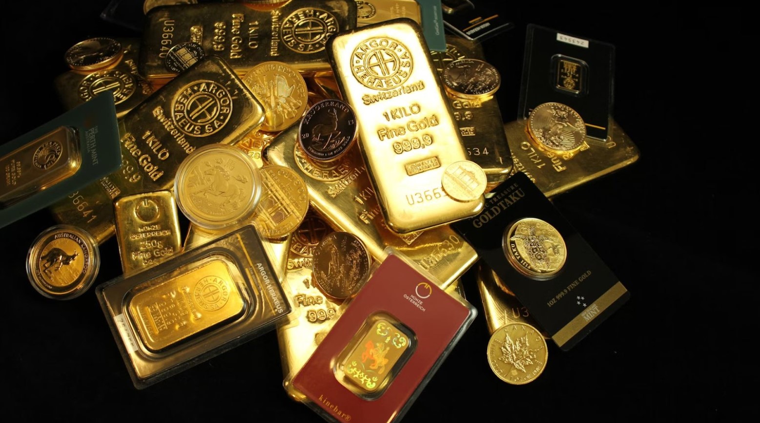 A pile of gold. There are gold coins and bars all piled together and vary in size and weight.