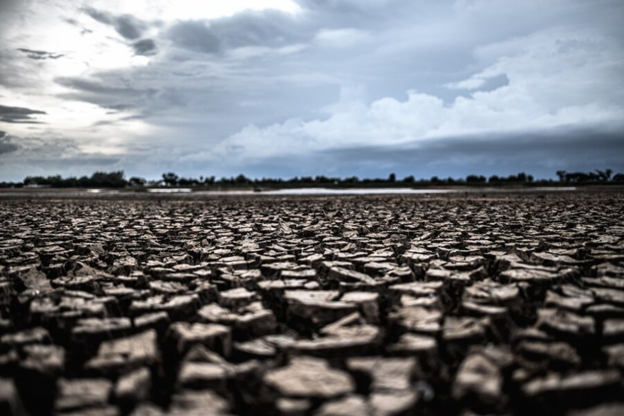 Photograph of a dried-up lake after a drought