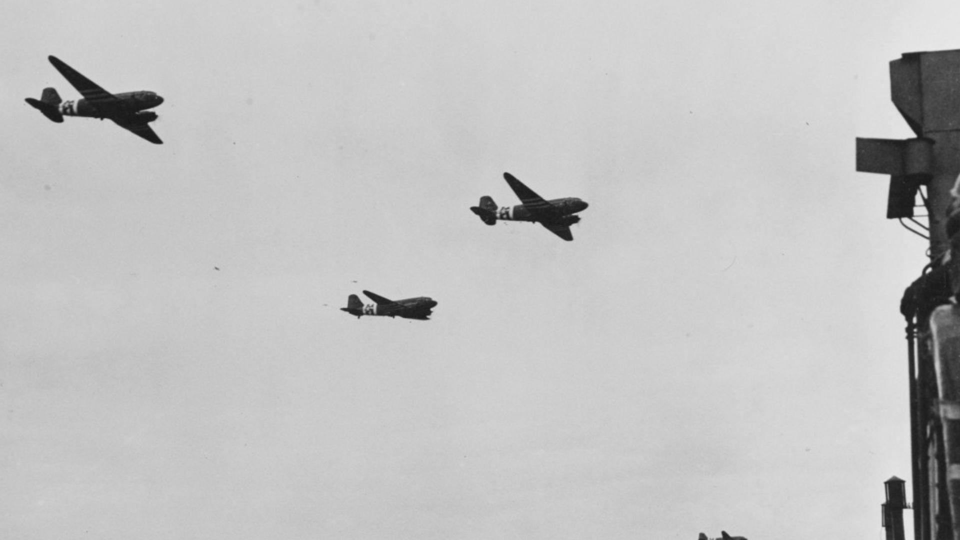 U.S. planes fly over Utah Beach in Normandy, France during the D-Day Invasion.
