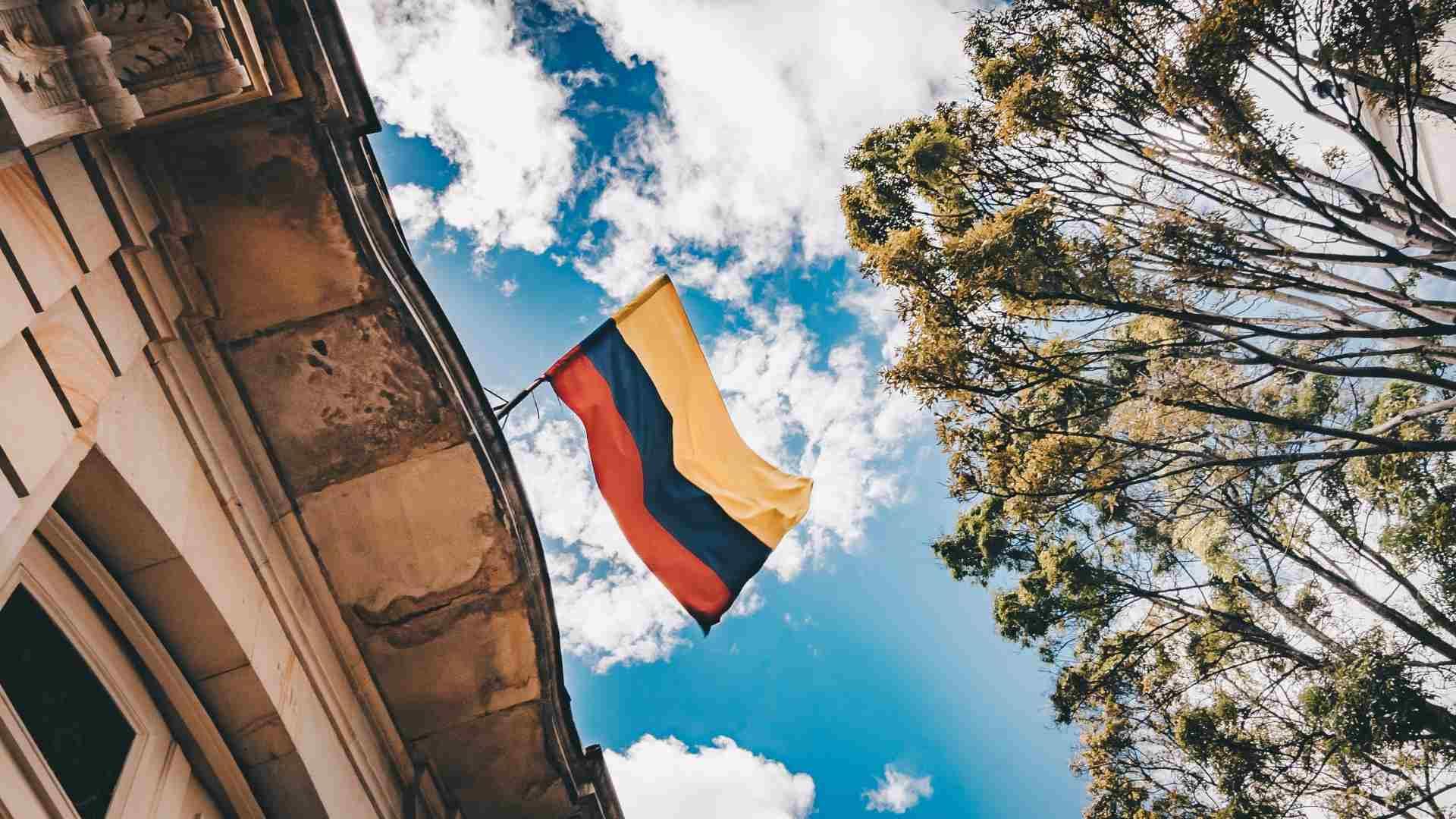 The flag of Colombia flying in downtown Bogotá.
