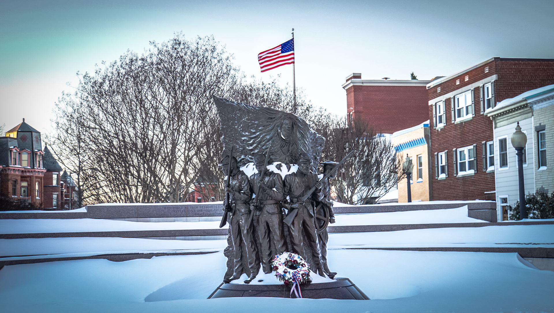 A memorial of the African American men who fought in the Civil War covered in snow