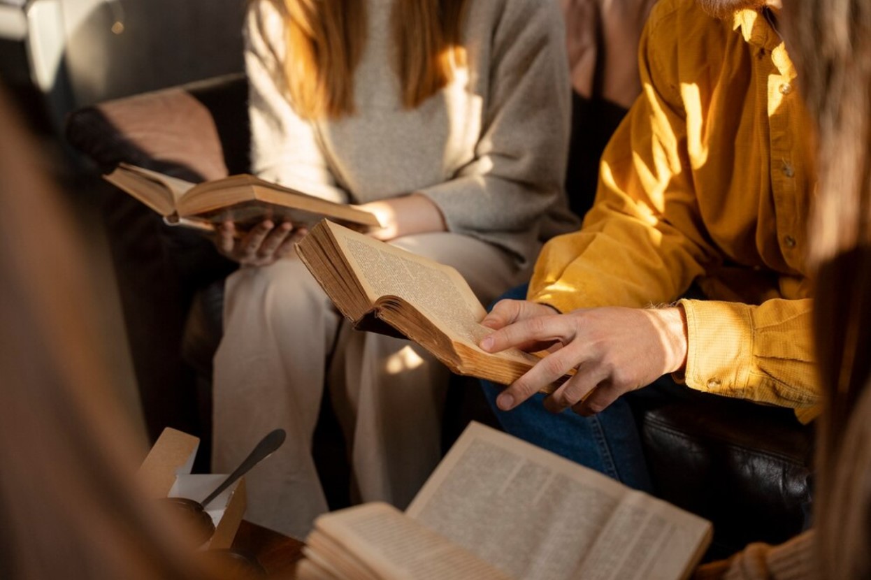 Group of people reading the Bible