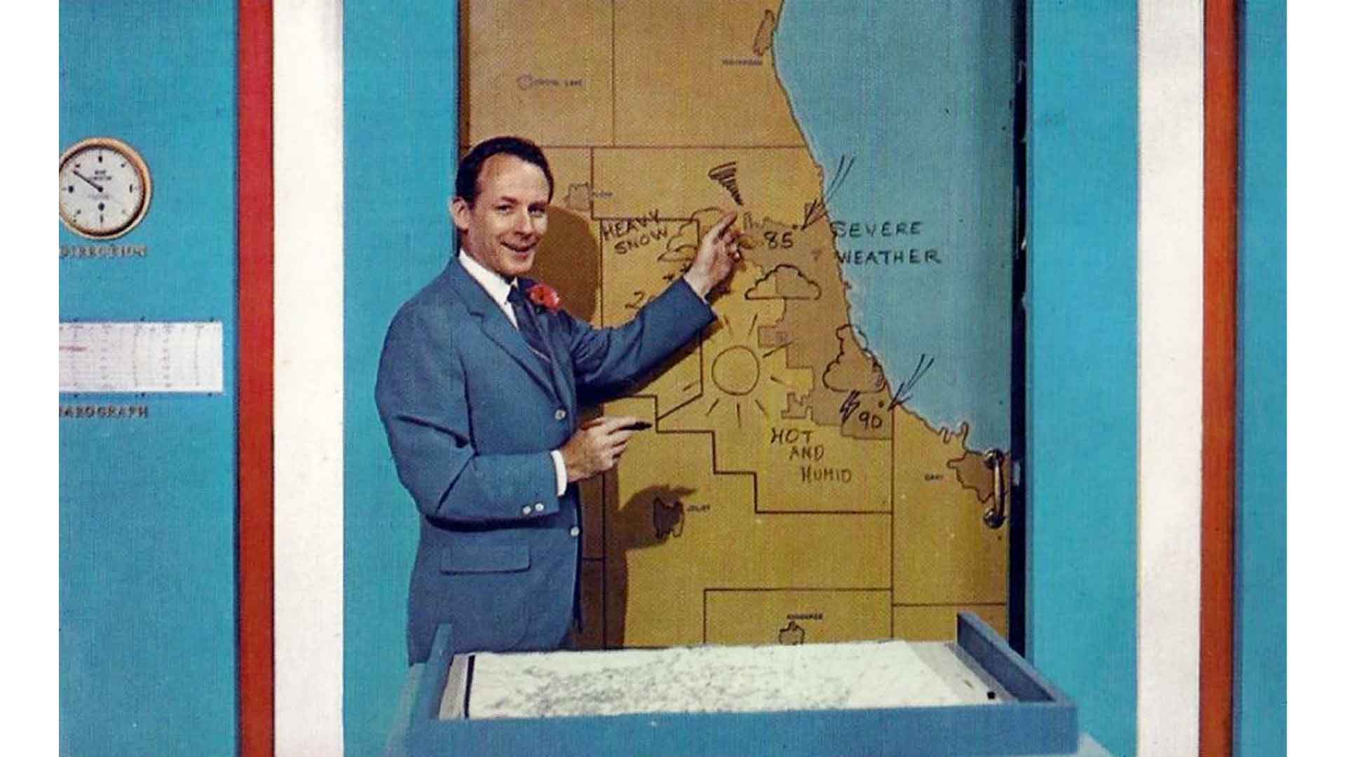 Postcard photo of television weatherman Harry Volkman on the WGN-TV news set.