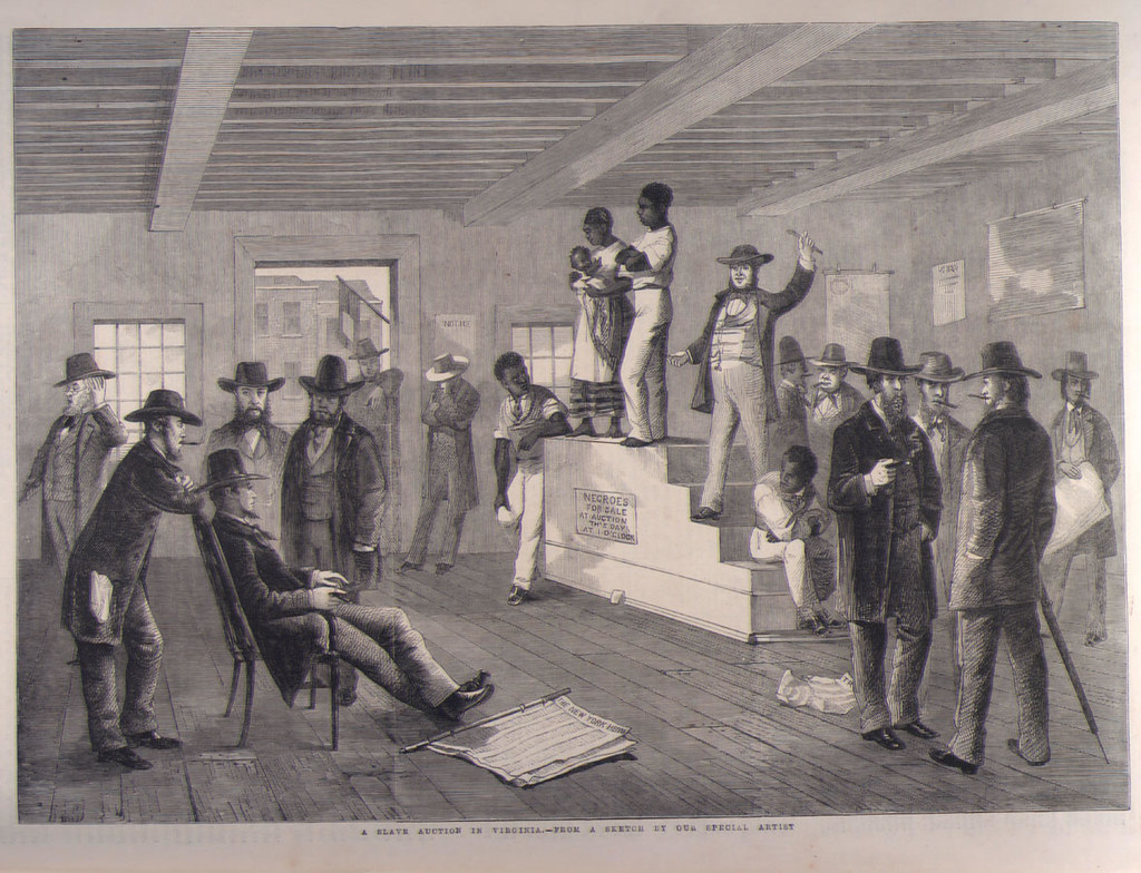 A grayscale drawing of an auction of slaves in America
