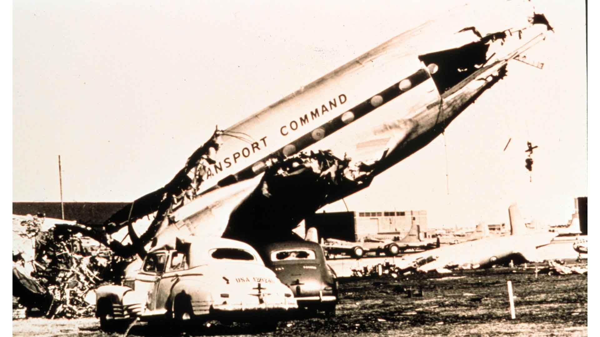 Damage to airplanes and cars from the 25 March tornado at Tinker Air Force Base