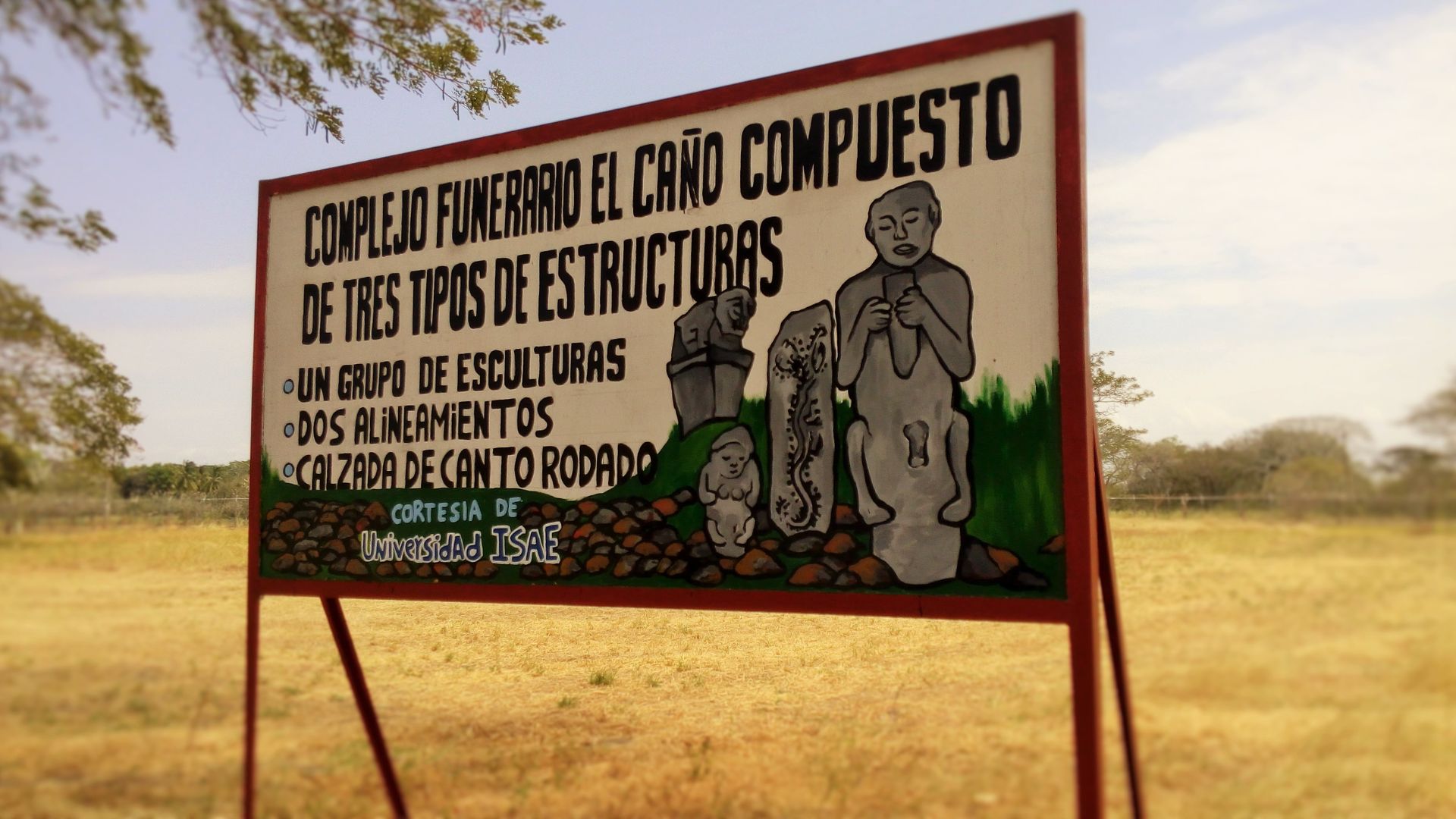 A national park sign seen in the daytime at El Caño Archaeological Park in Panama.