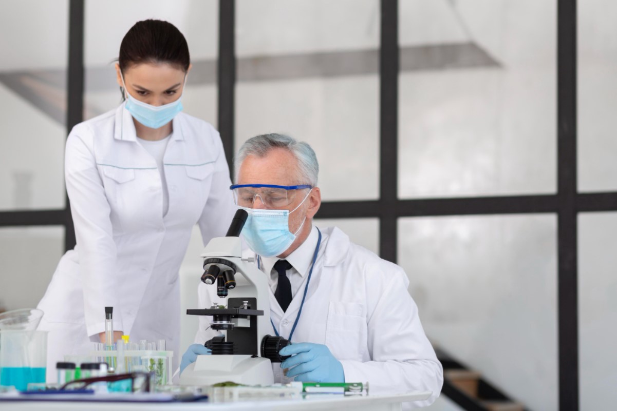 Scientists pictured in their laboratory performing a test