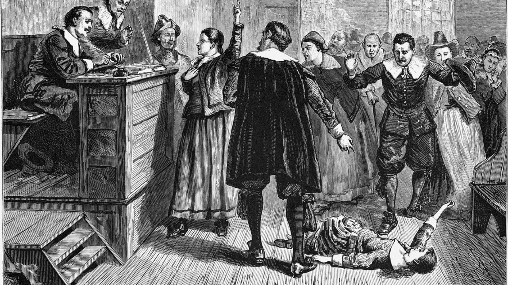A black-and-white engraving depicting a courtroom scene during the Salem Witch Trials. The central figure in this 1876 illustration is usually identified as Mary Walcott.