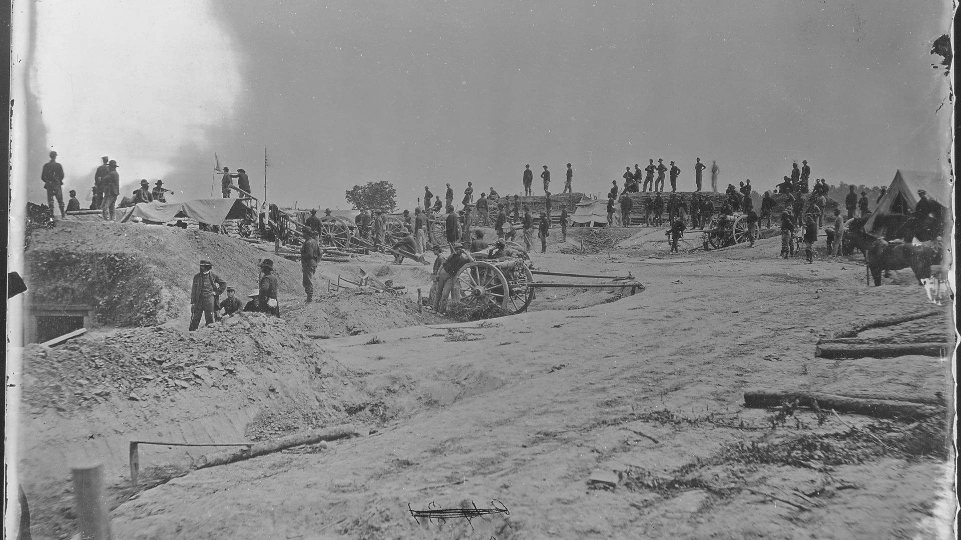 A black and white Civil War photograph from 1863 by Matthew Brady that shows ongoing battery action.