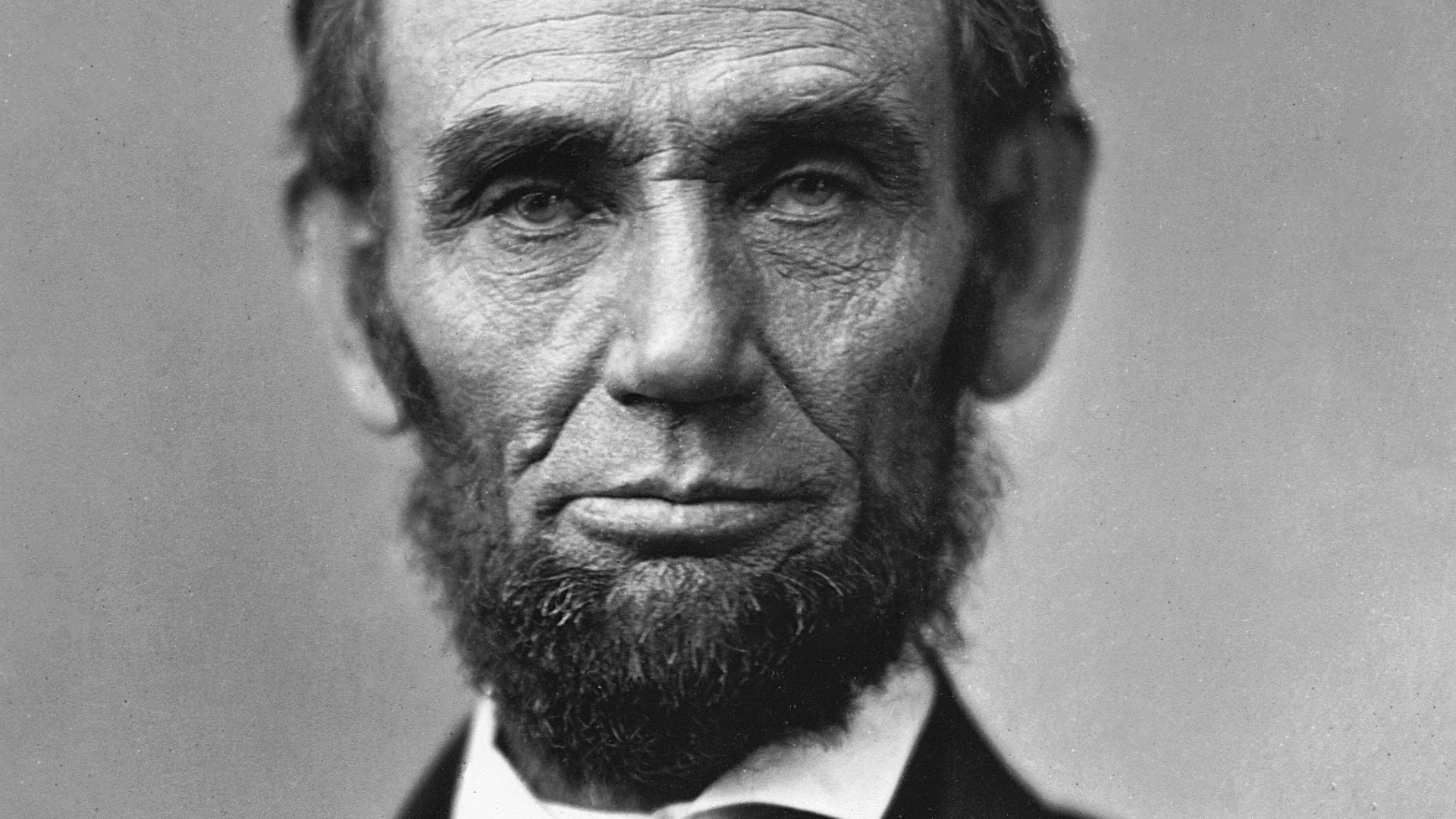 A black and white portrait photo of Abraham Lincoln in 1863.
