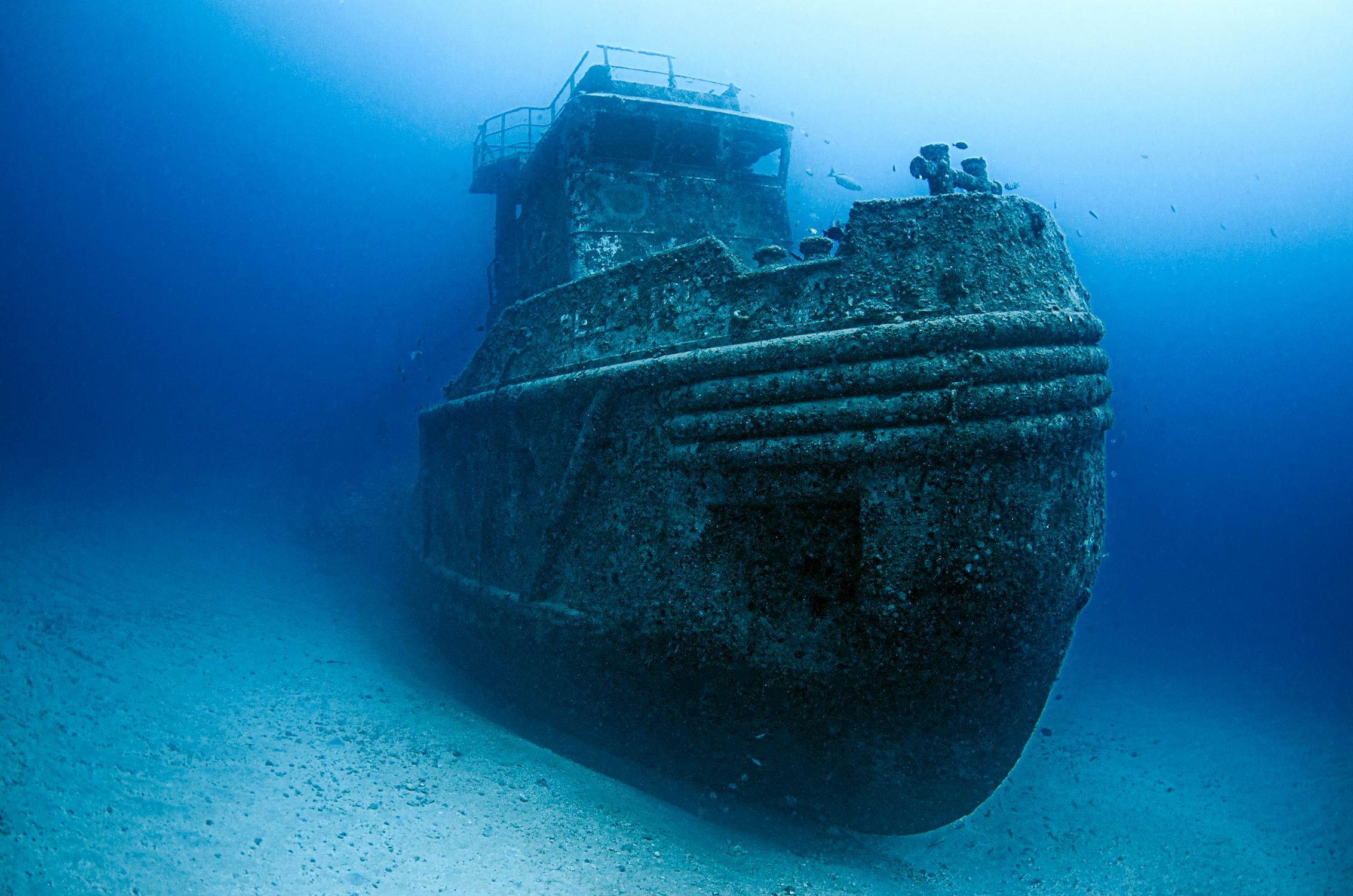 An underwater image of a sunken ship