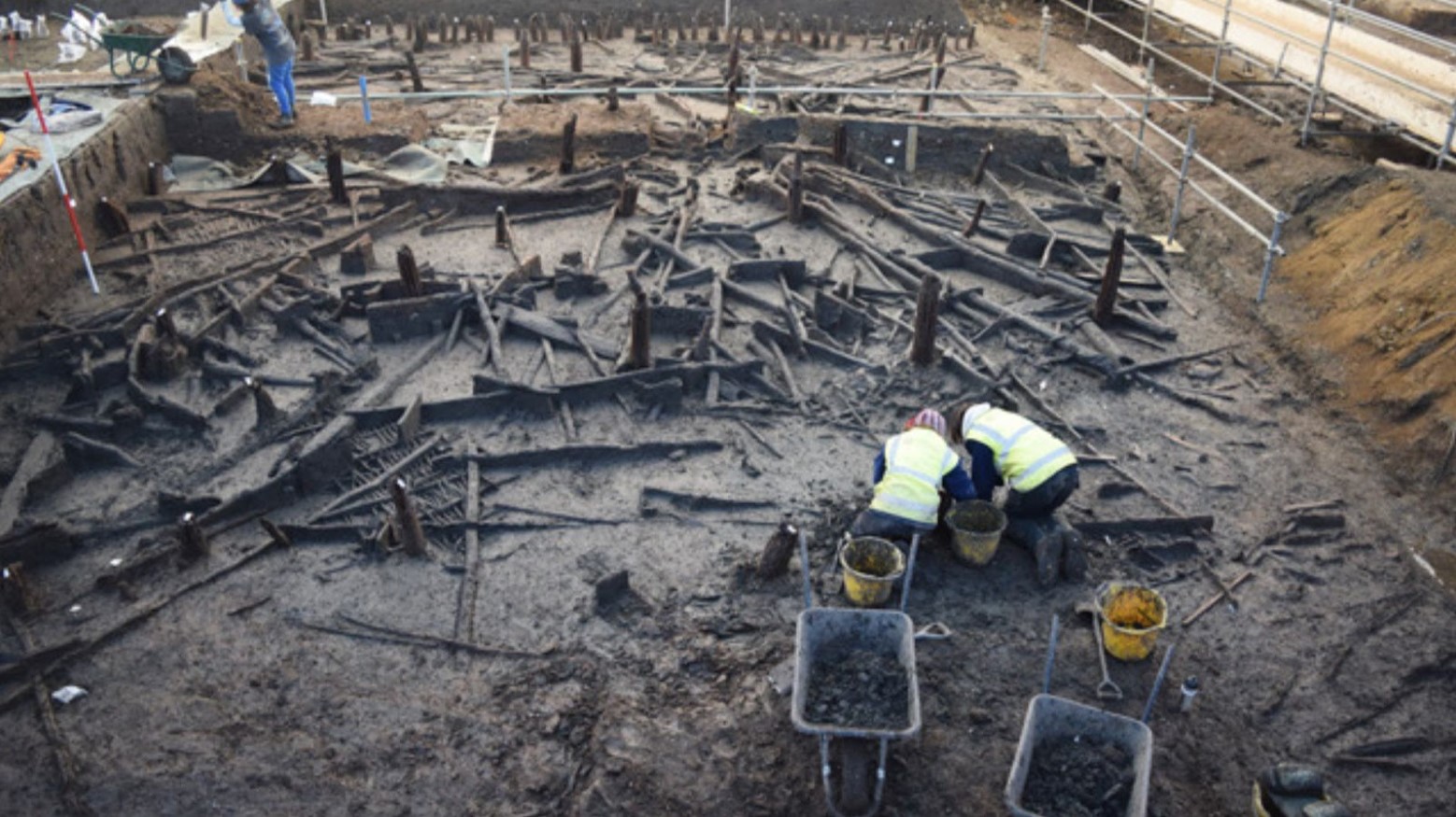 An image from early on in the excavation at Must Farm showing some of the wood mass