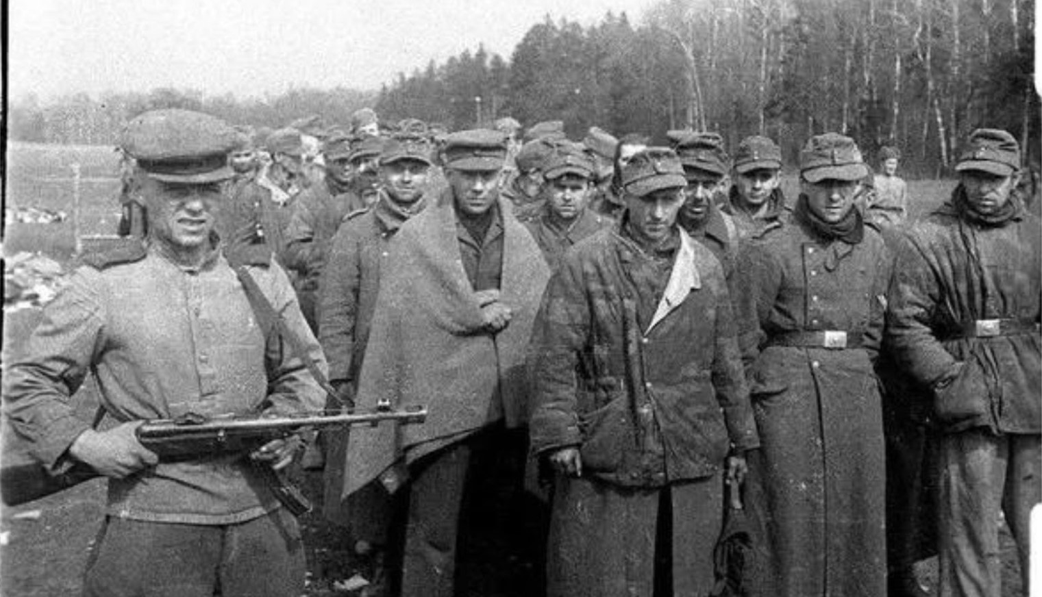 Several prisoners in a German war camp during WWII